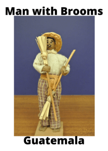 Guatemala Man With Brooms