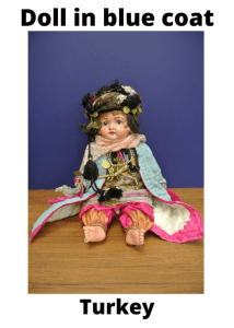 Turkey Doll In Blue Coat